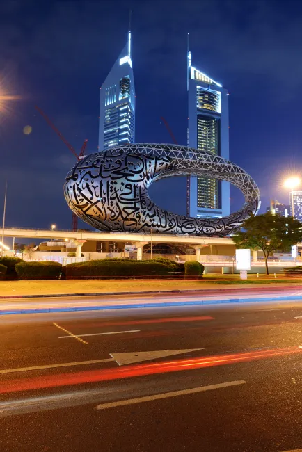 External shot of the Museum of the Future in Dubai, timelapse photo taken at night