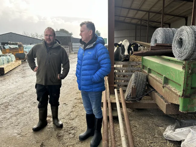 SCC-farmer-member-Sion-Hughes-showing-Nigel-Owens-around-his-farm
